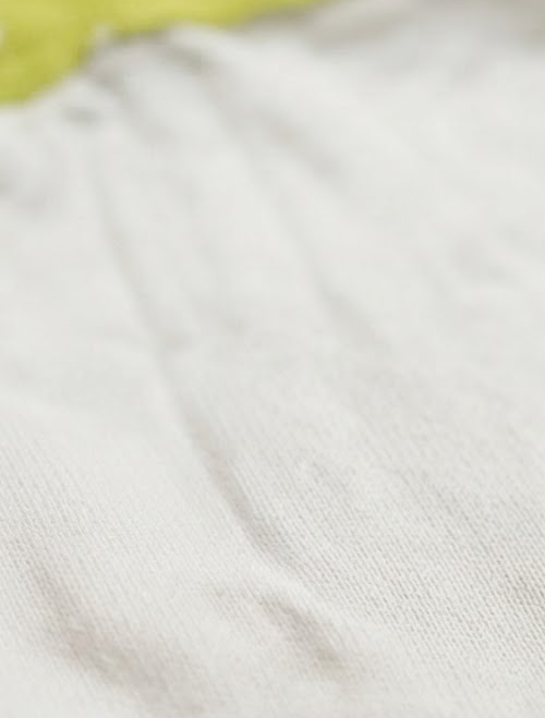 Green and white onesie