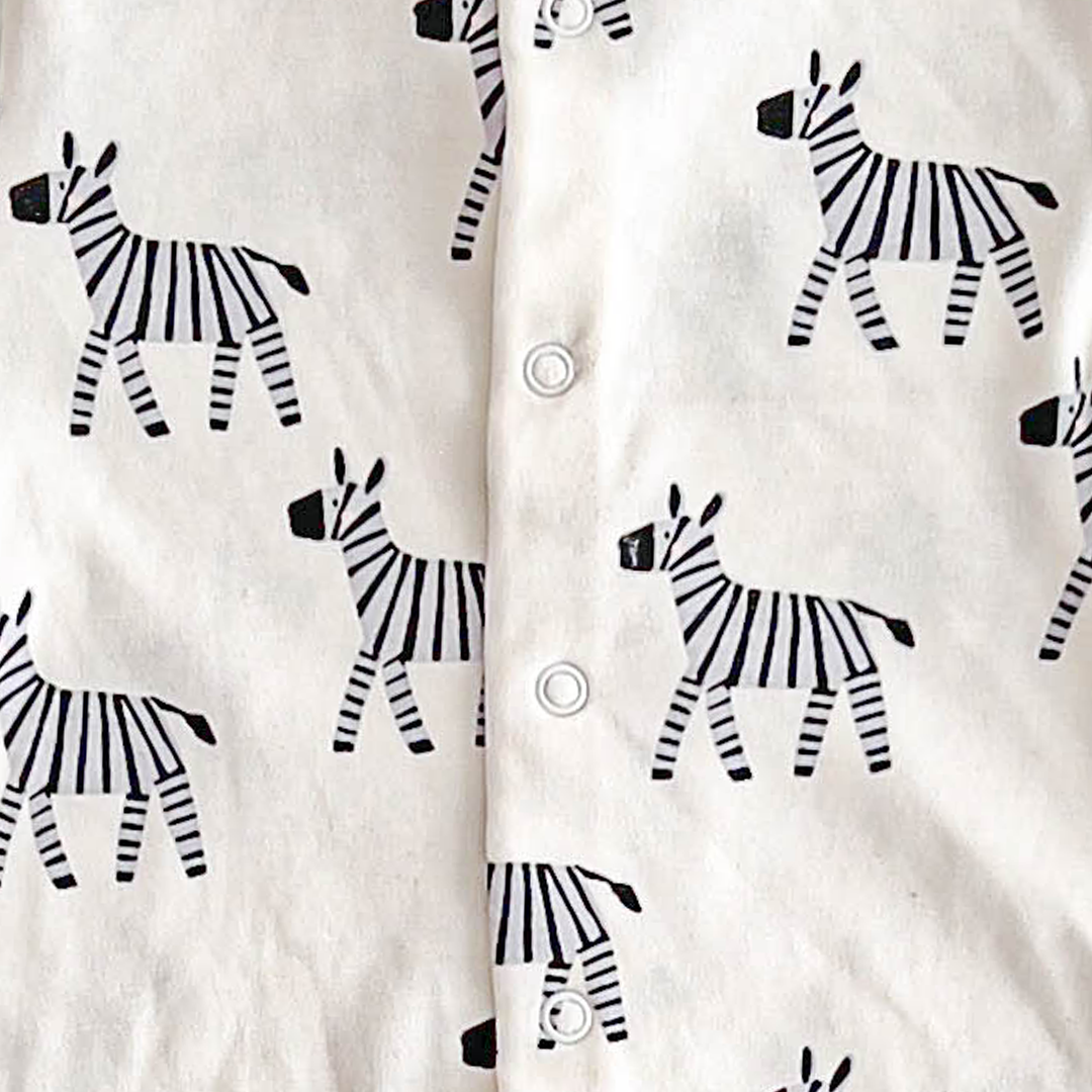 ZEBRA PRINTED WHITE SLEEPSUIT