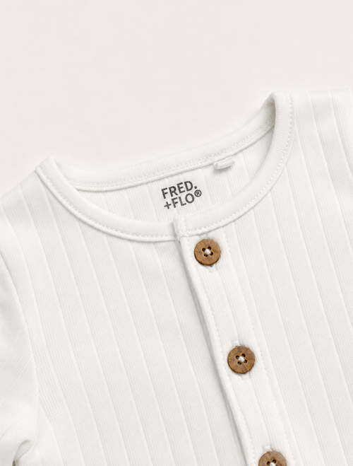 White ribbed button onesie