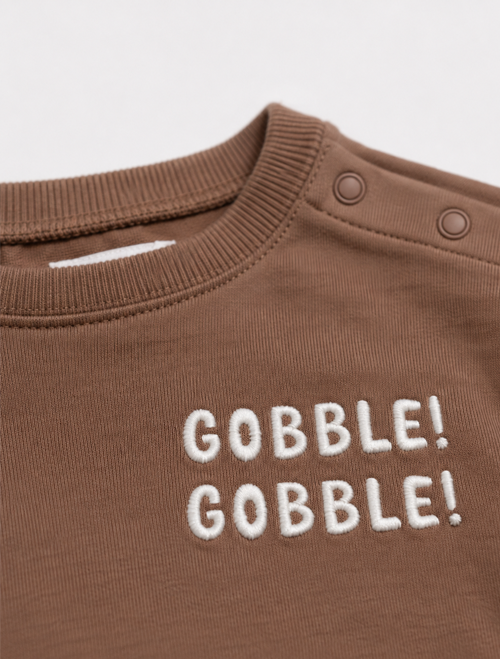 Brown boys onesie