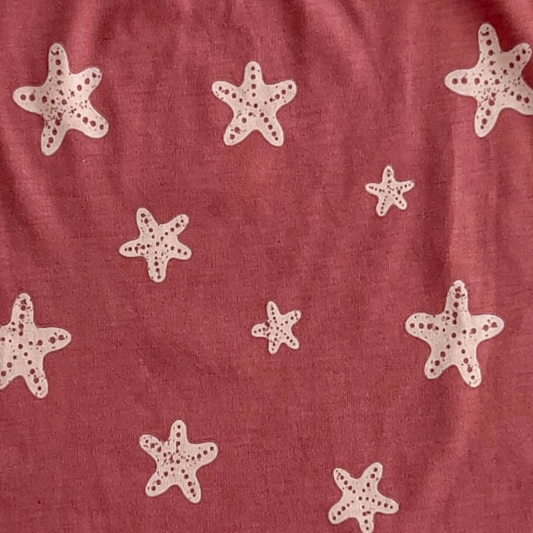 FLUTTER-SLEEVED PATTERNED JUMPSUIT