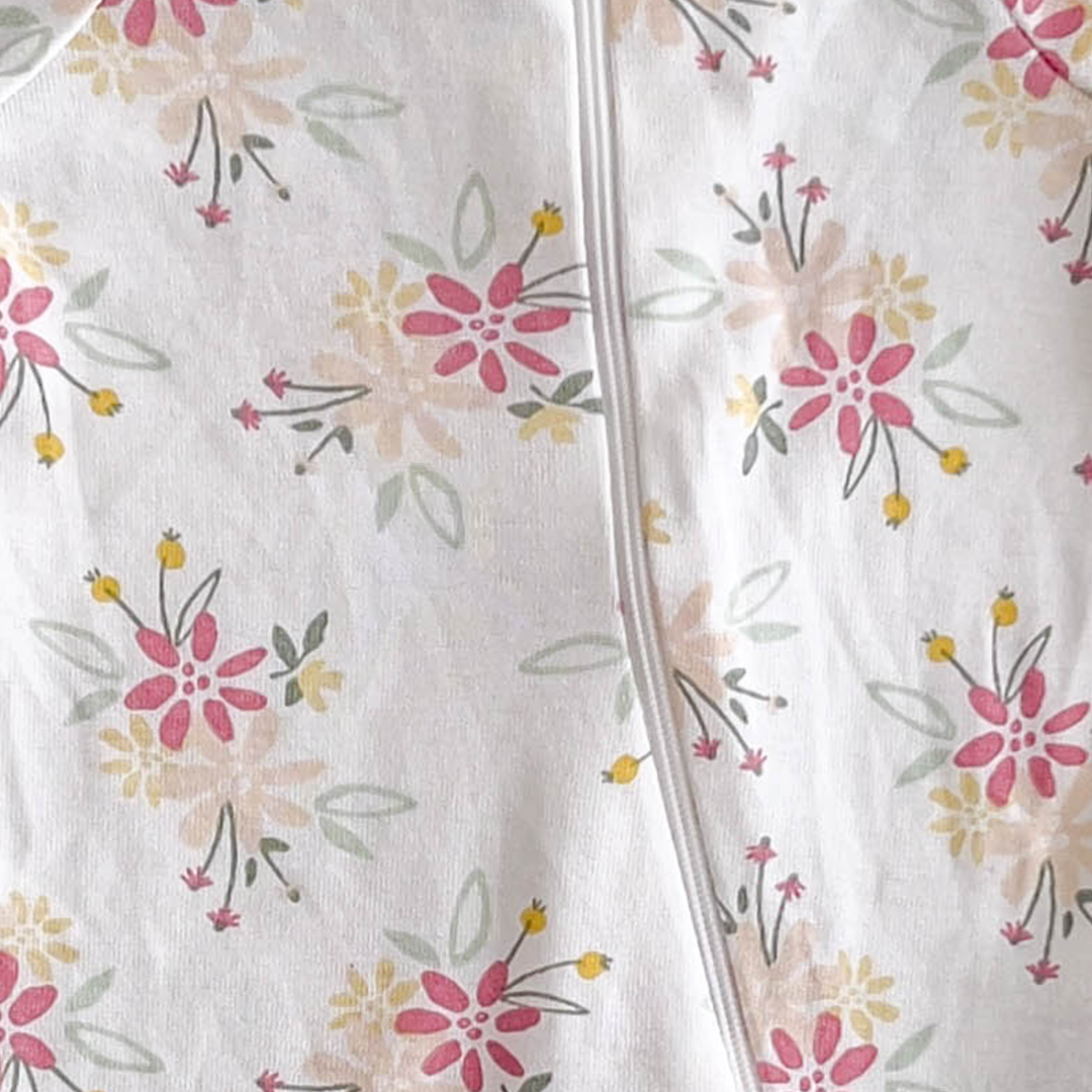 PINK FLORAL RUFFLED SLEEPSUIT