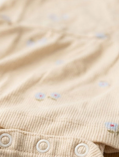 Beige floral ribbed sunsuit