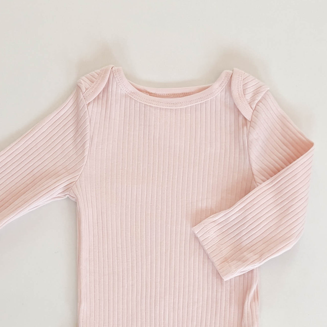 CREAMY PEACH RIBBED ONESIE