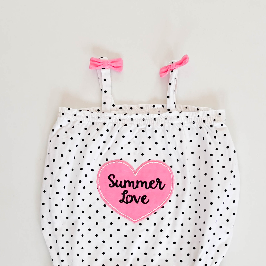 BLACK POLKA DOTTED ONESIE