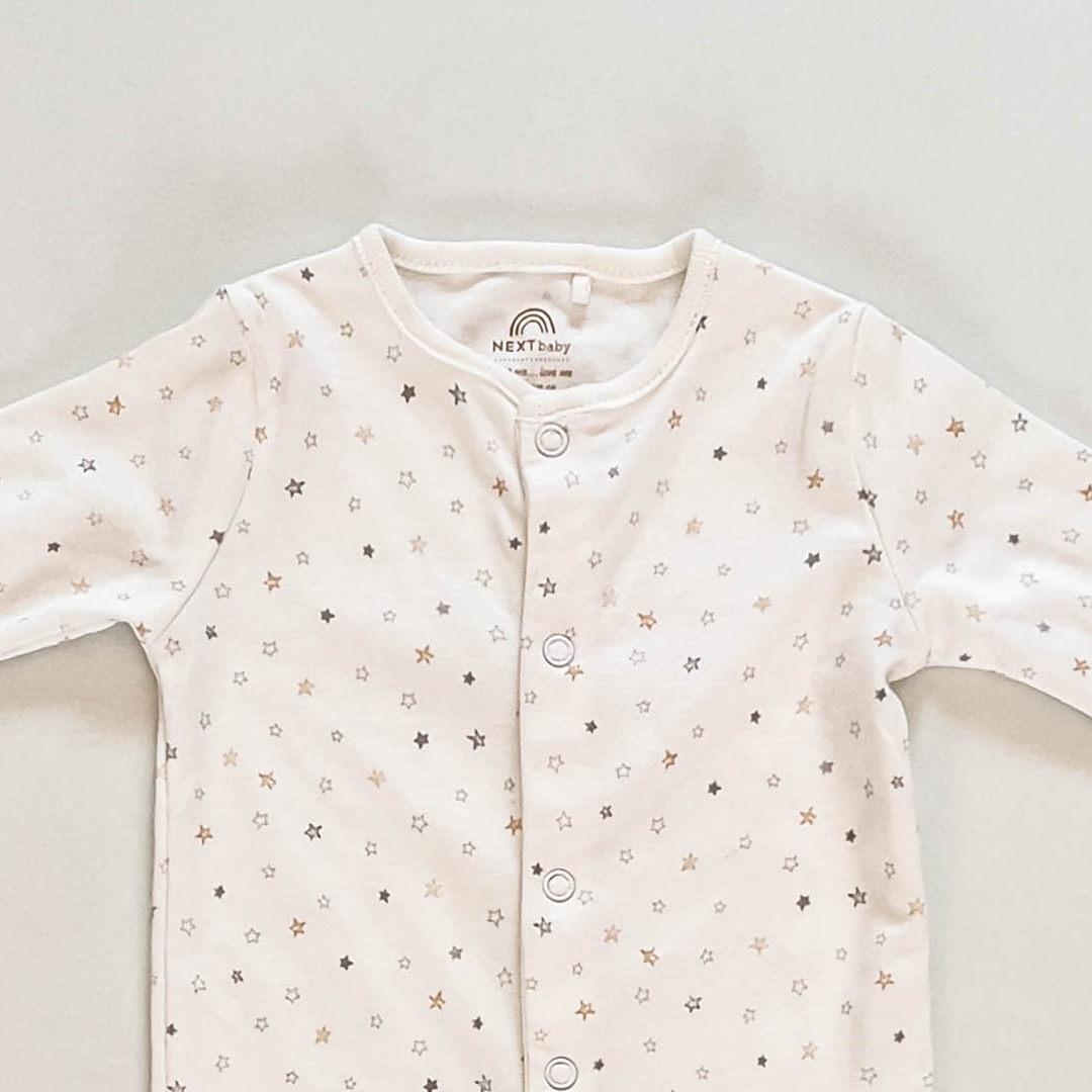 WHITE STAR PRINTED SLEEPSUIT