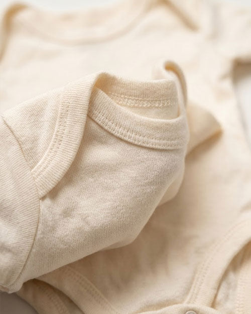 Off white plain onesie