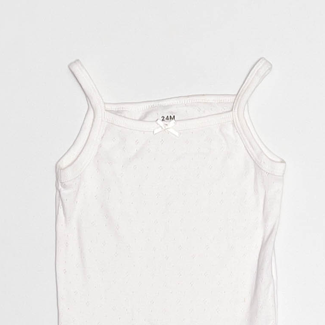 WHITE POINTELLE SLEEVELESS ONESIE