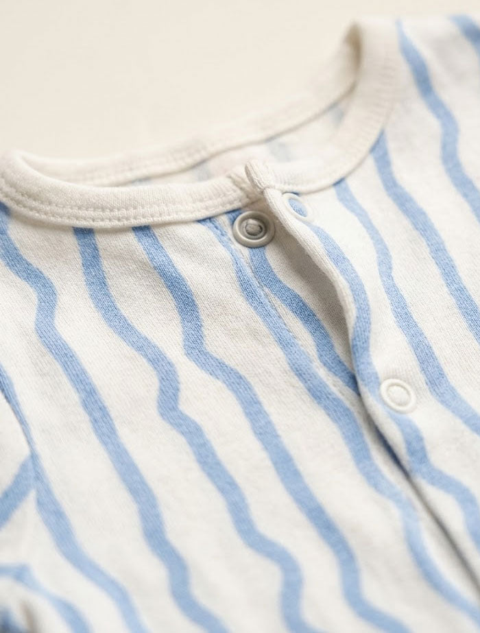 Blue and white patterned button sleepsuit