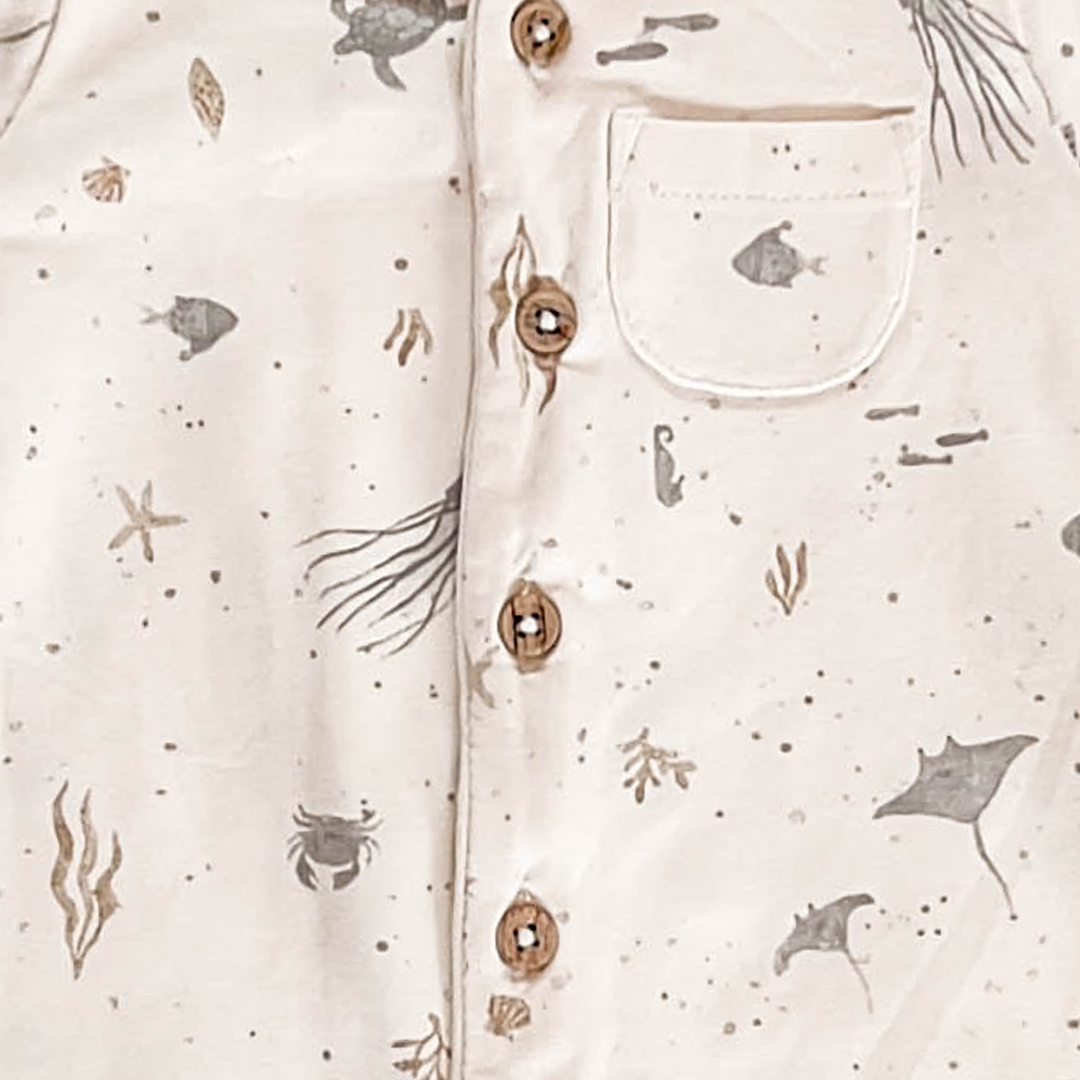 IVORY OCEAN PRINTED JUMPSUIT