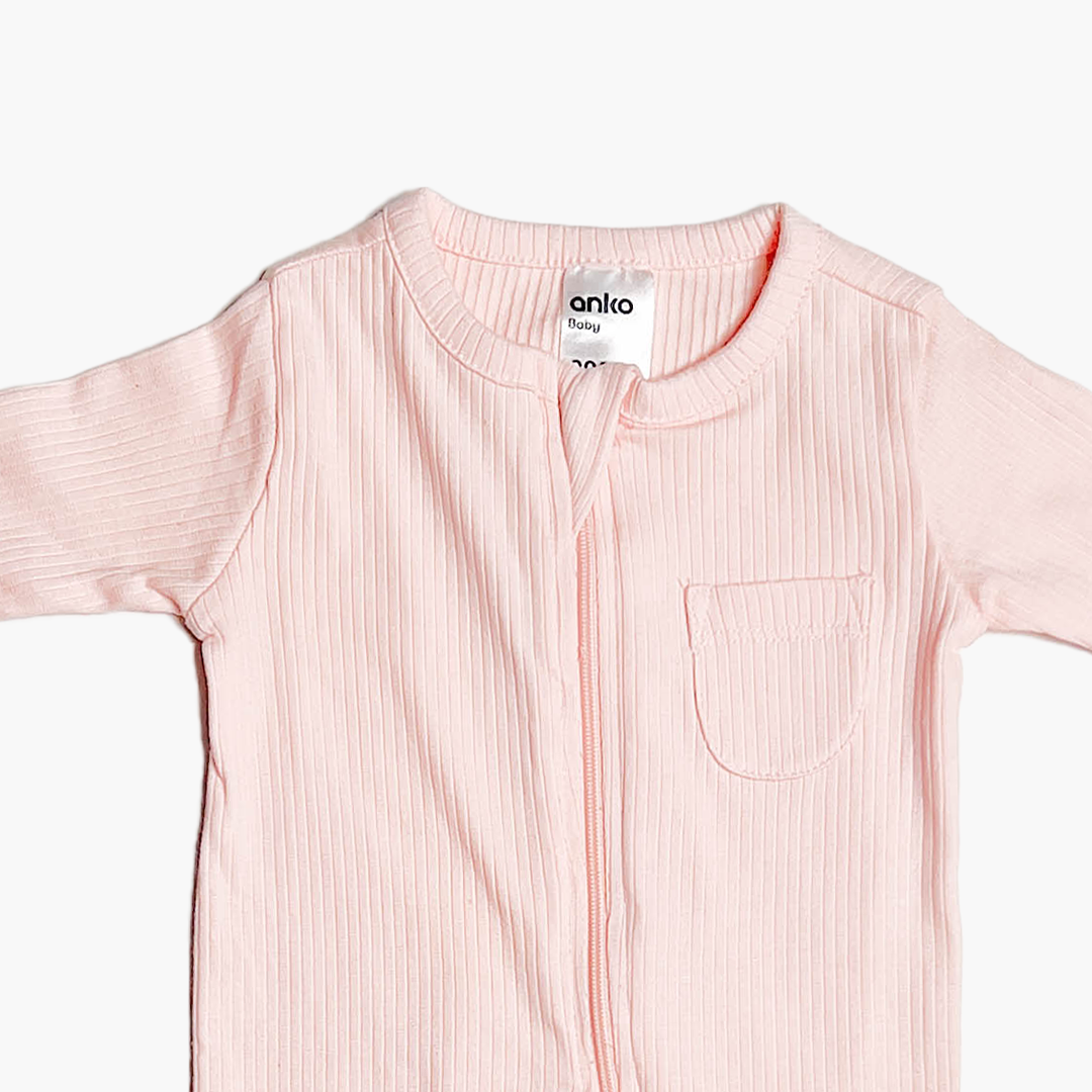POWDER PINK RIBBED SLEEPSUIT
