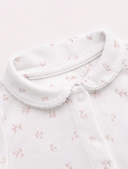 White floral patterned onesie
