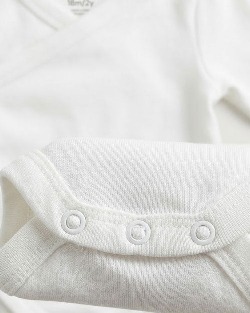 White wrap over plain onesie