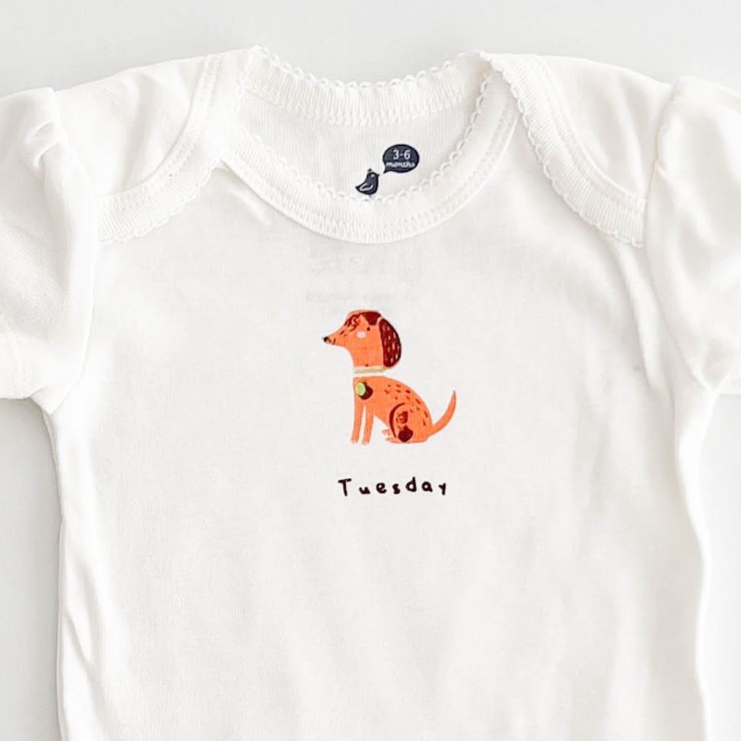 TUESDAY PRINTED ONESIE