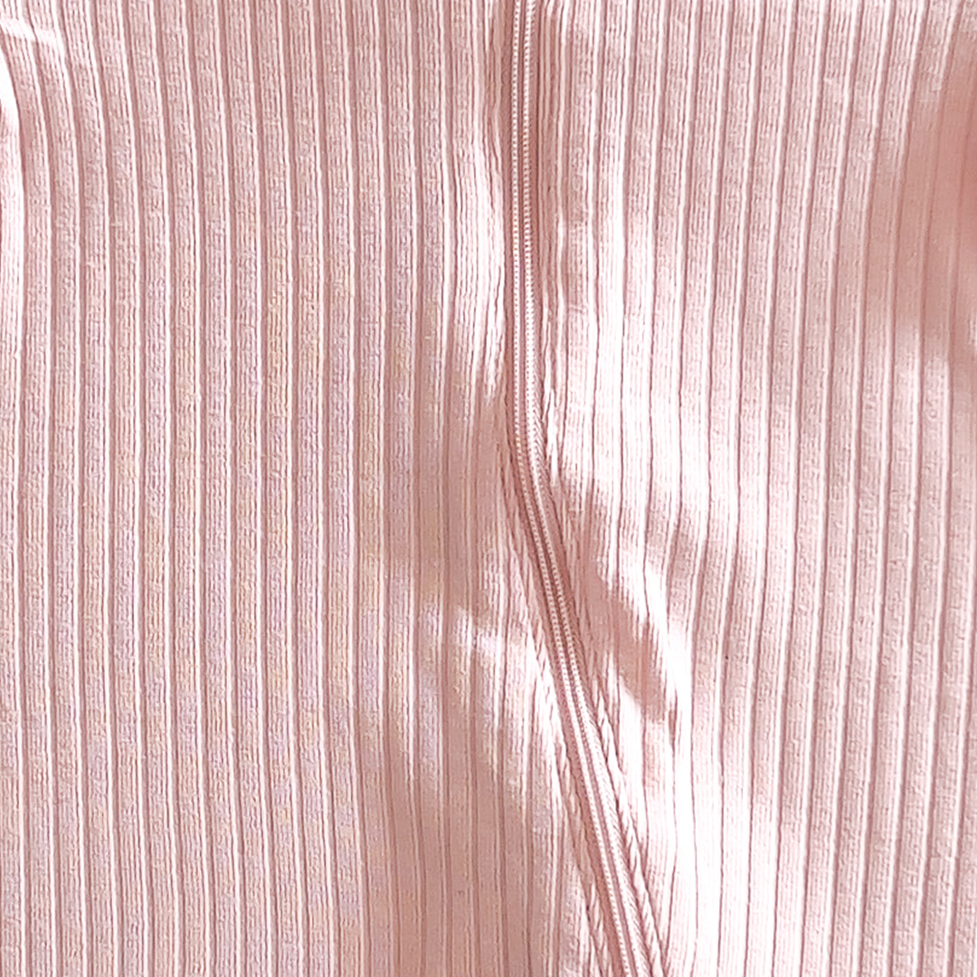Pink ribbed sleepsuit