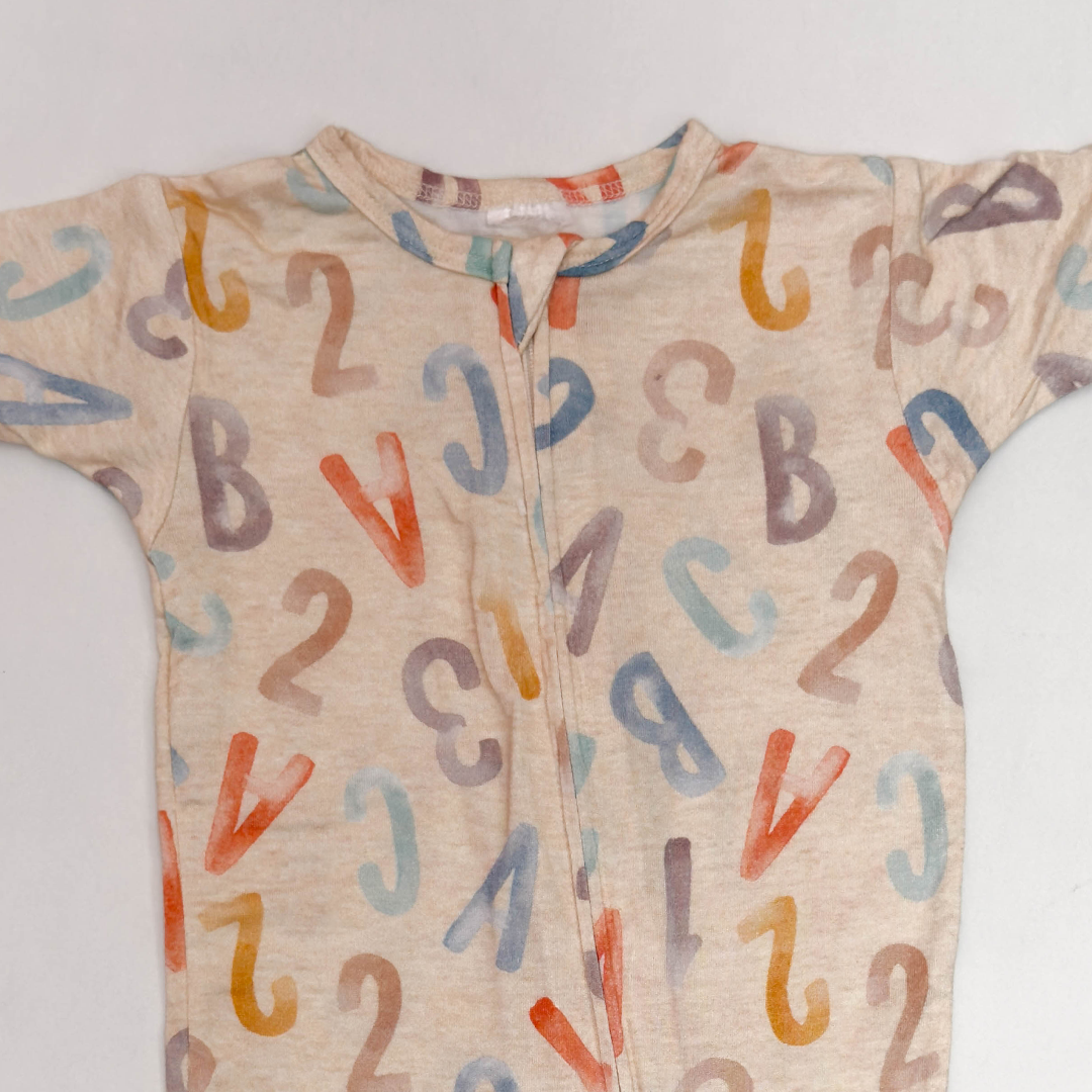 BEIGE PRINTED VISCOUS ZIPPER JUMPSUIT