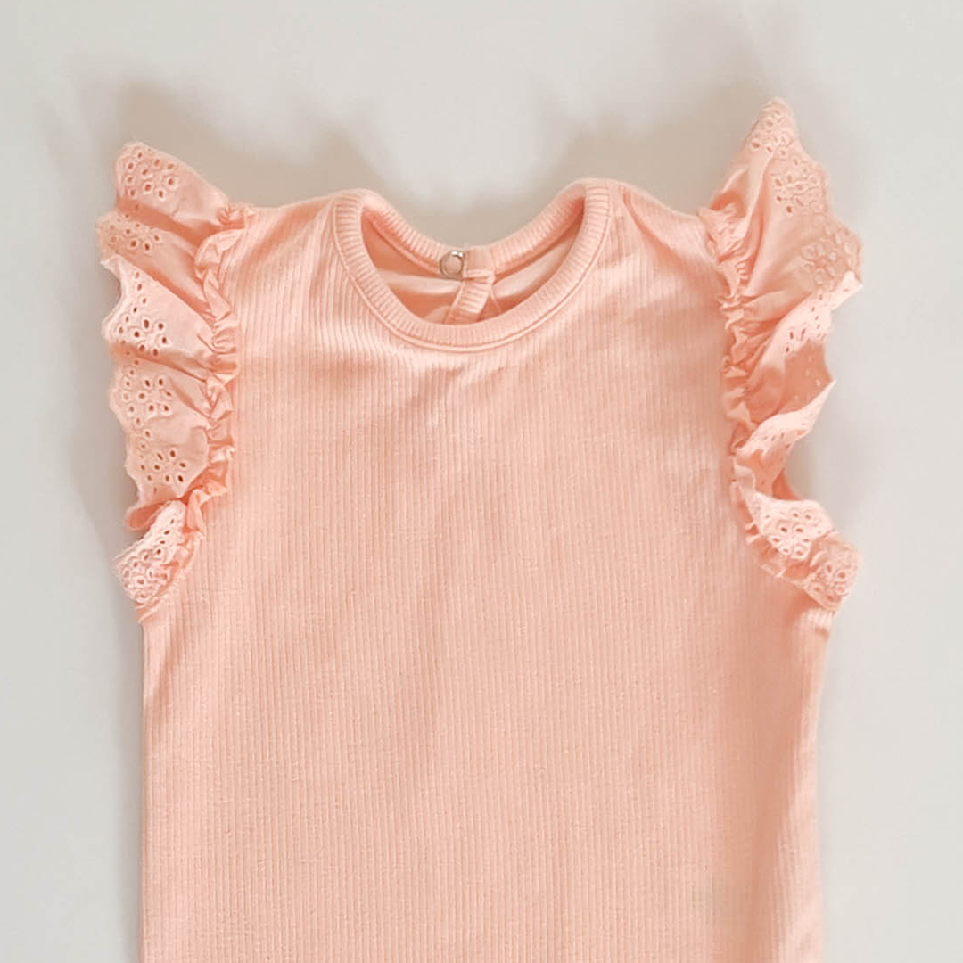 PEACH RIBBED ONESIE