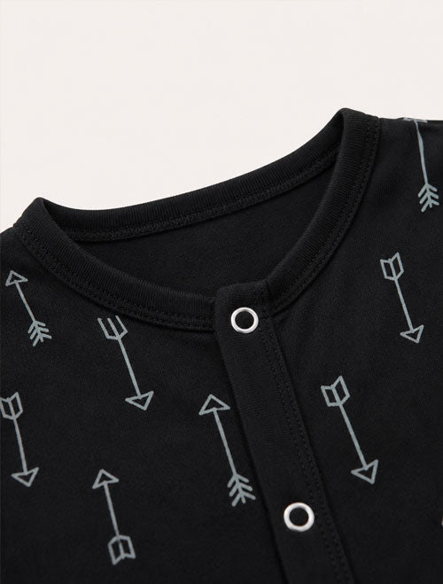 Black arrow printed button romper