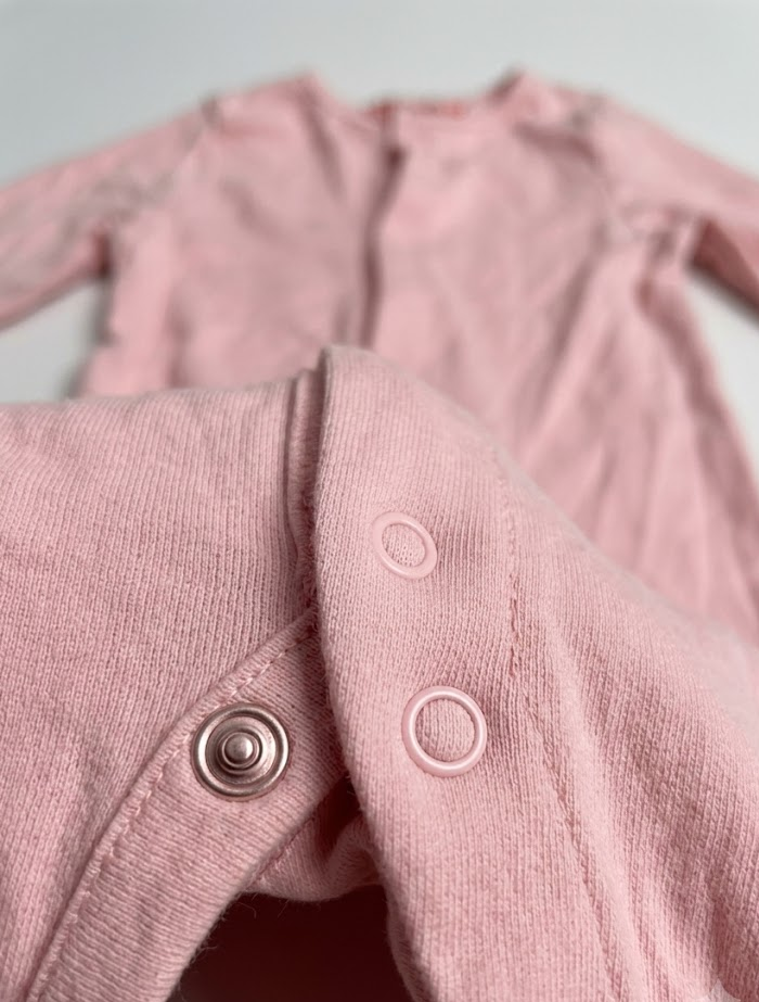 Dusty pink button sleepsuit