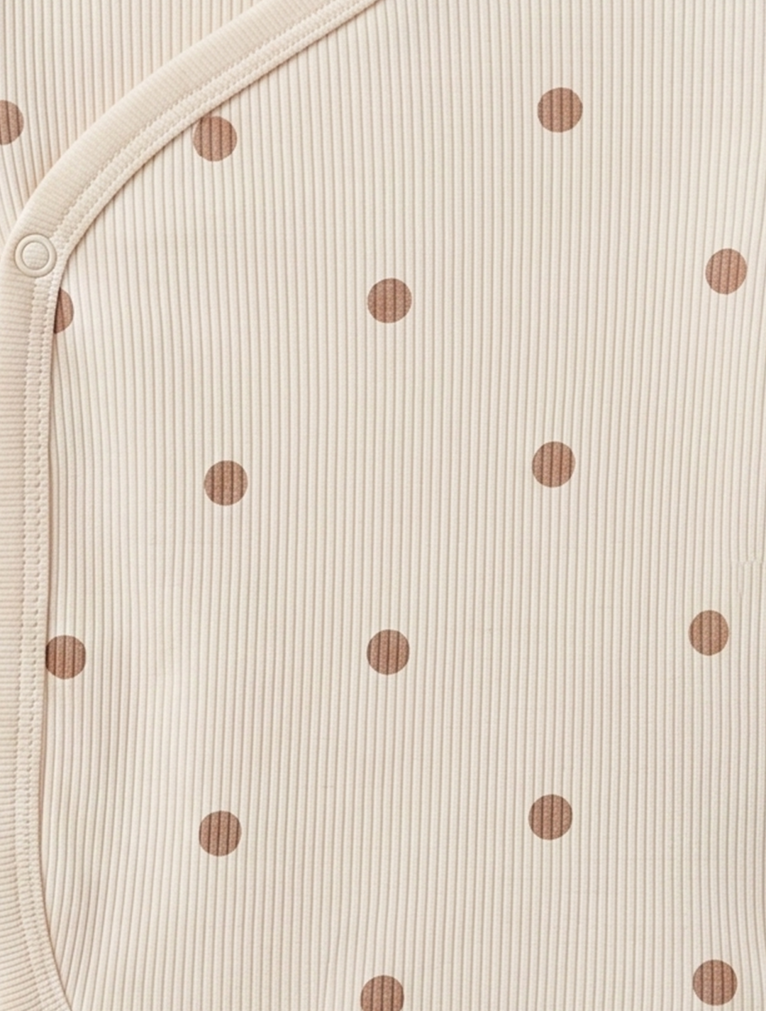 BEIGE POLKA DOTTED WRAPOVER ONESIE