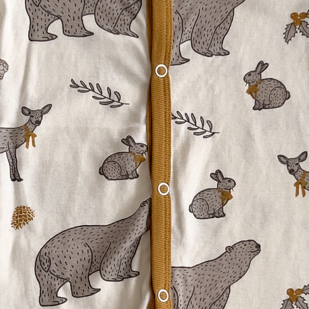 animal patterned off white sleepsuit