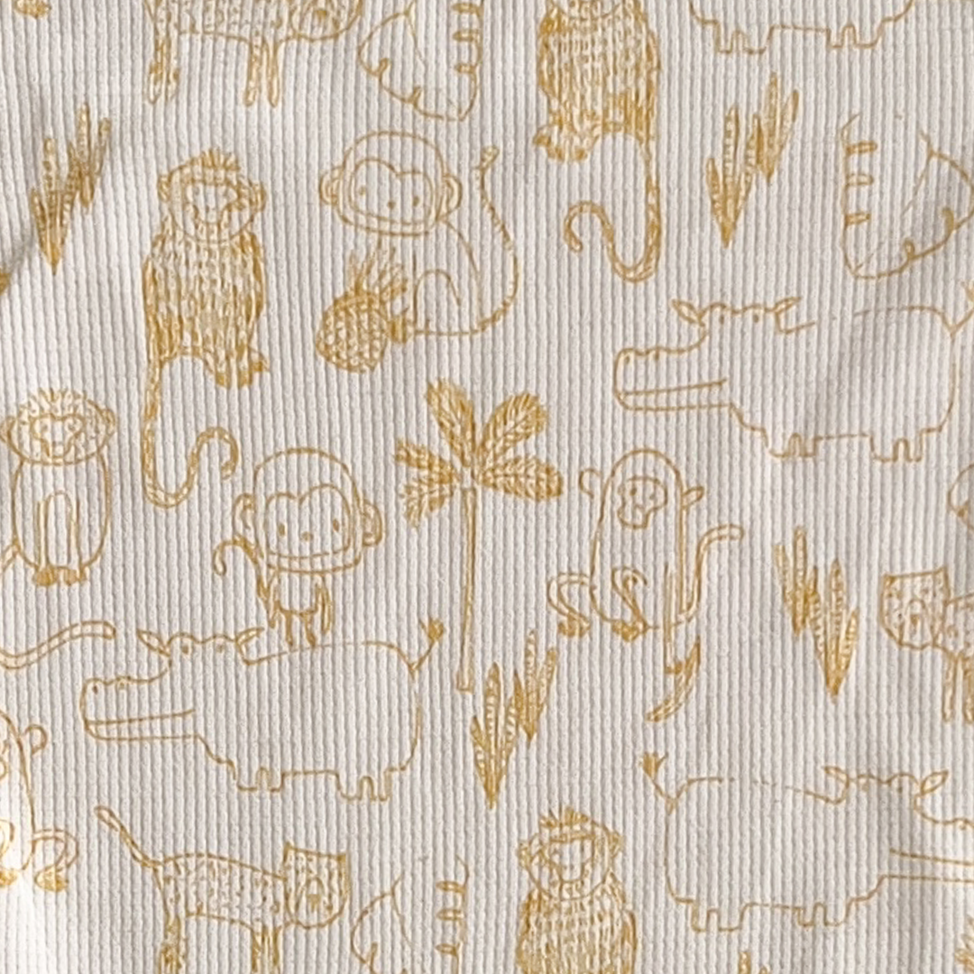 YELLOW ANIMAL PATTERNED ONESIE