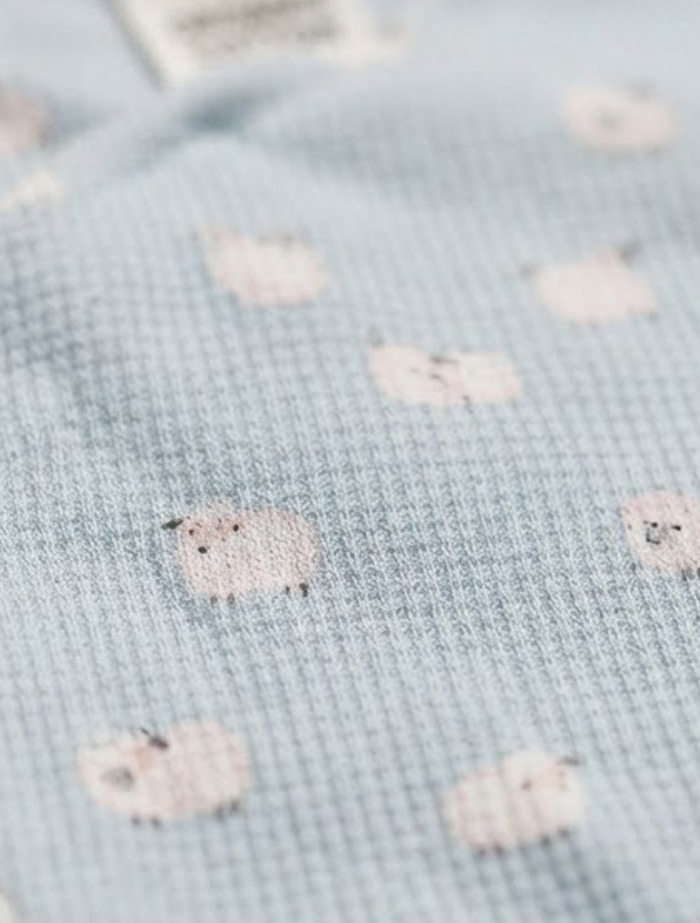 Blue knitted sheep printed sleep suit