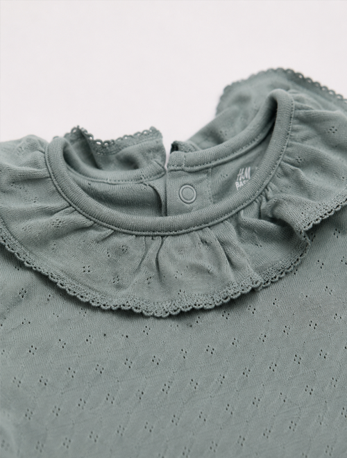 Sage green pointelle ruffle onesie
