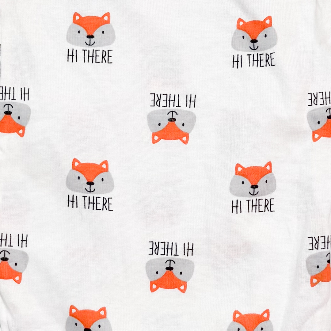 WHITE PATTERNED ONESIE