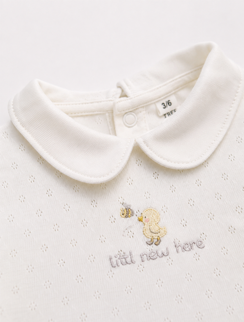 White pointelle peter pan collar onesie