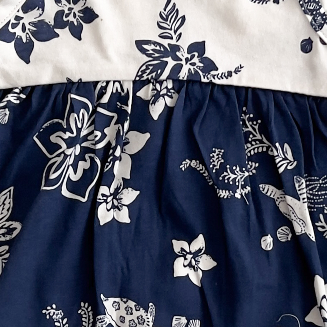 BLUE AND WHITE FLORAL PRINT SUNSUIT