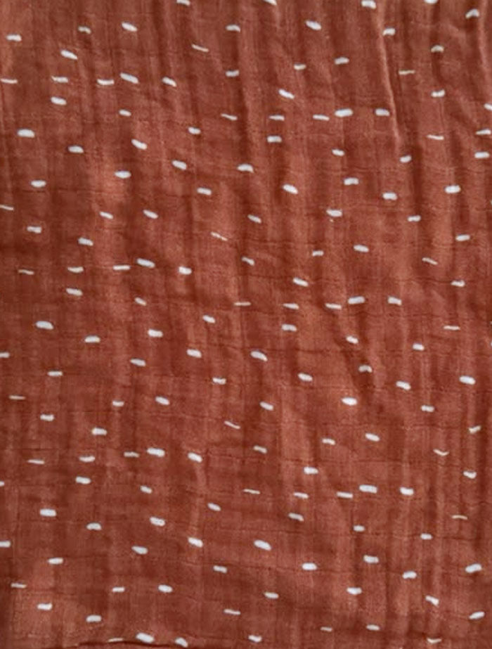 Brown patterned organic cotton muslin swaddle
