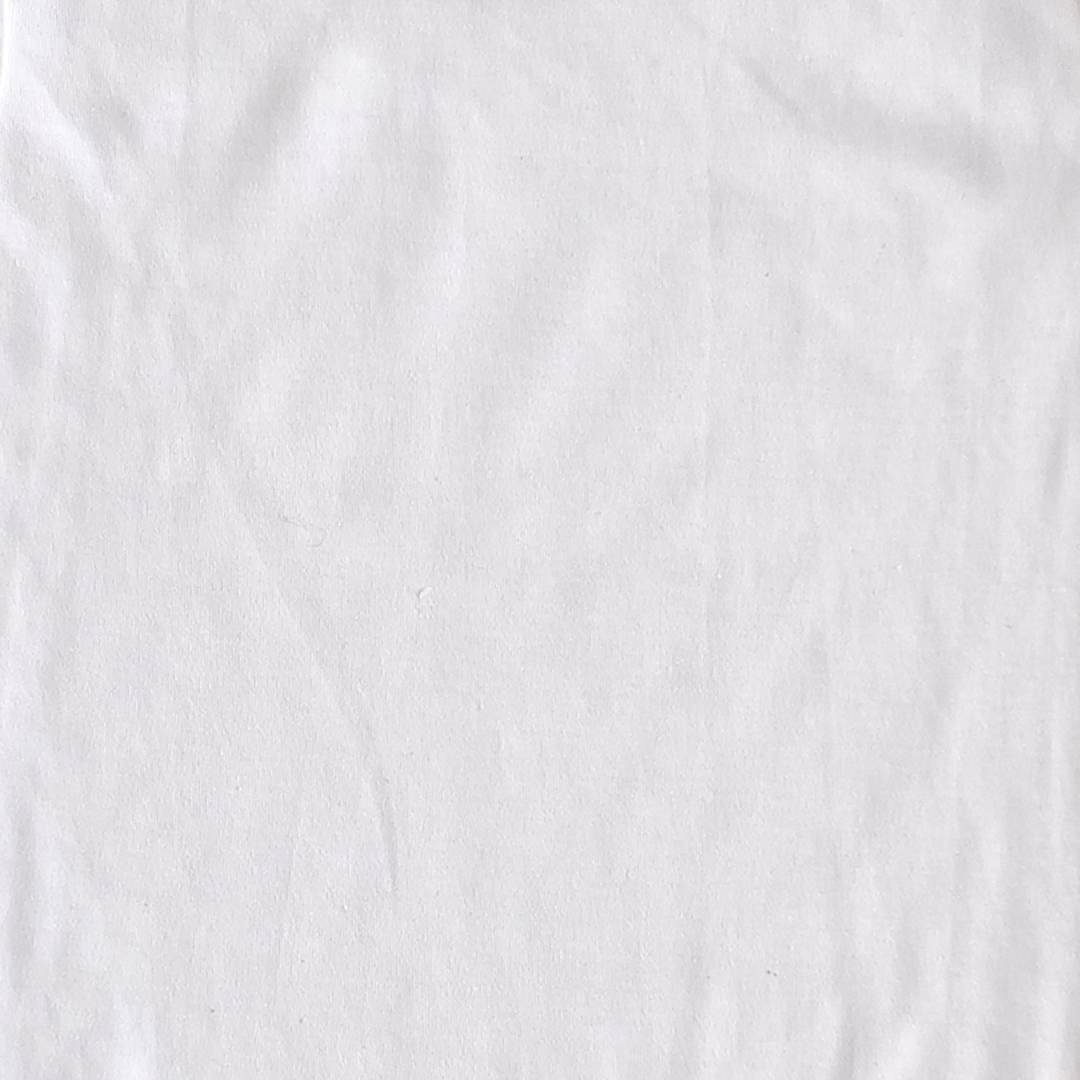 WHITE SLEEVLESS ONESIE