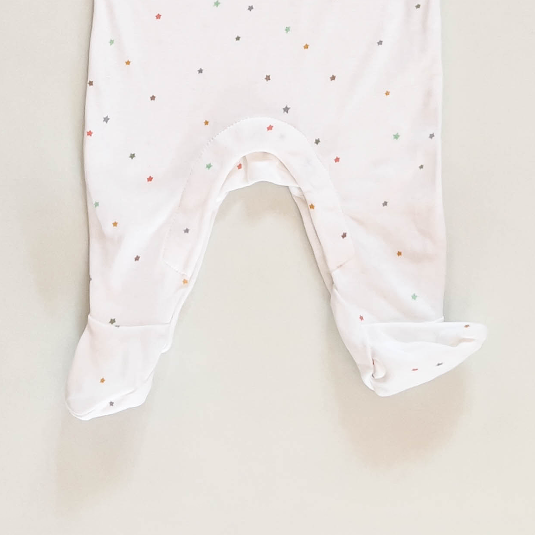 WHITE START PATTERNED SLEEPSUIT