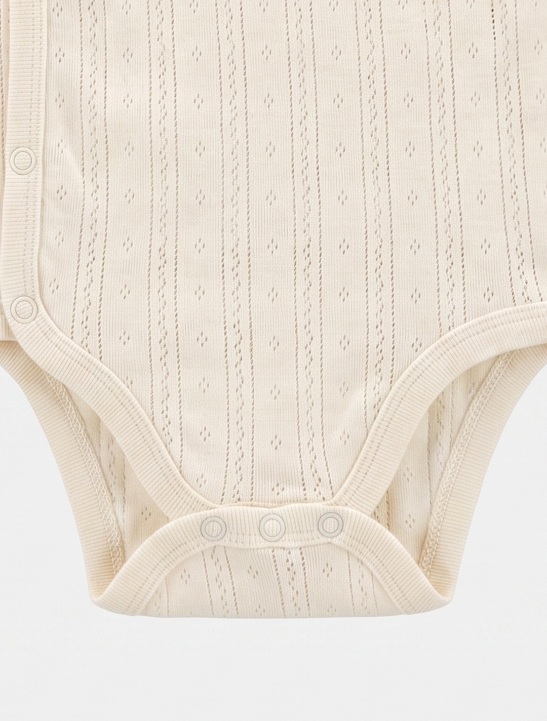 WHITE POINTELLE WRAPOVER ONESIE