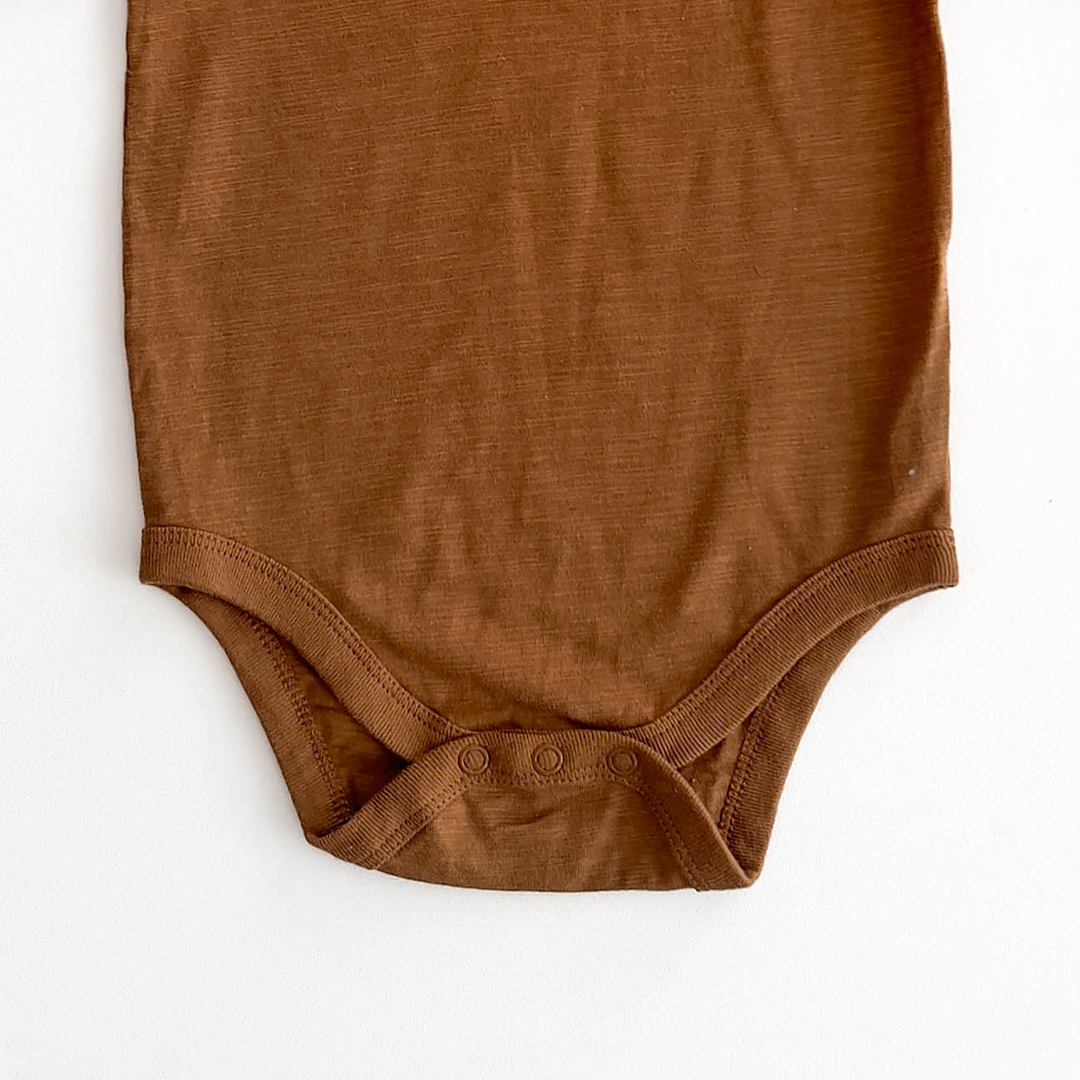 BROWN PATTERNED ONESIE