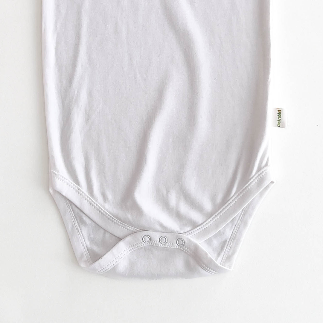 WHITE SLEEVELESS ONESIE