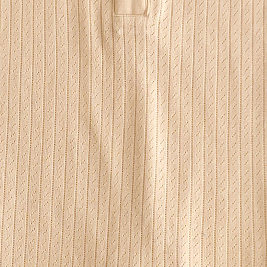 BUTTERMILK COLOURED POINTELLE ROMPER