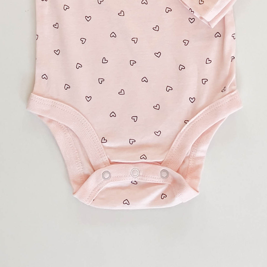 PEACH LOVE PATTERNED ONESIE