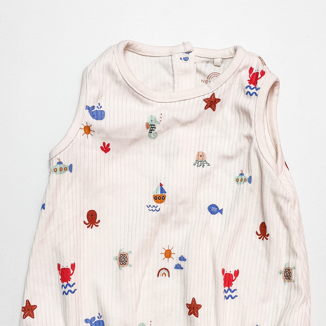 OFF WHITE RIBBED OCEAN ONESIE