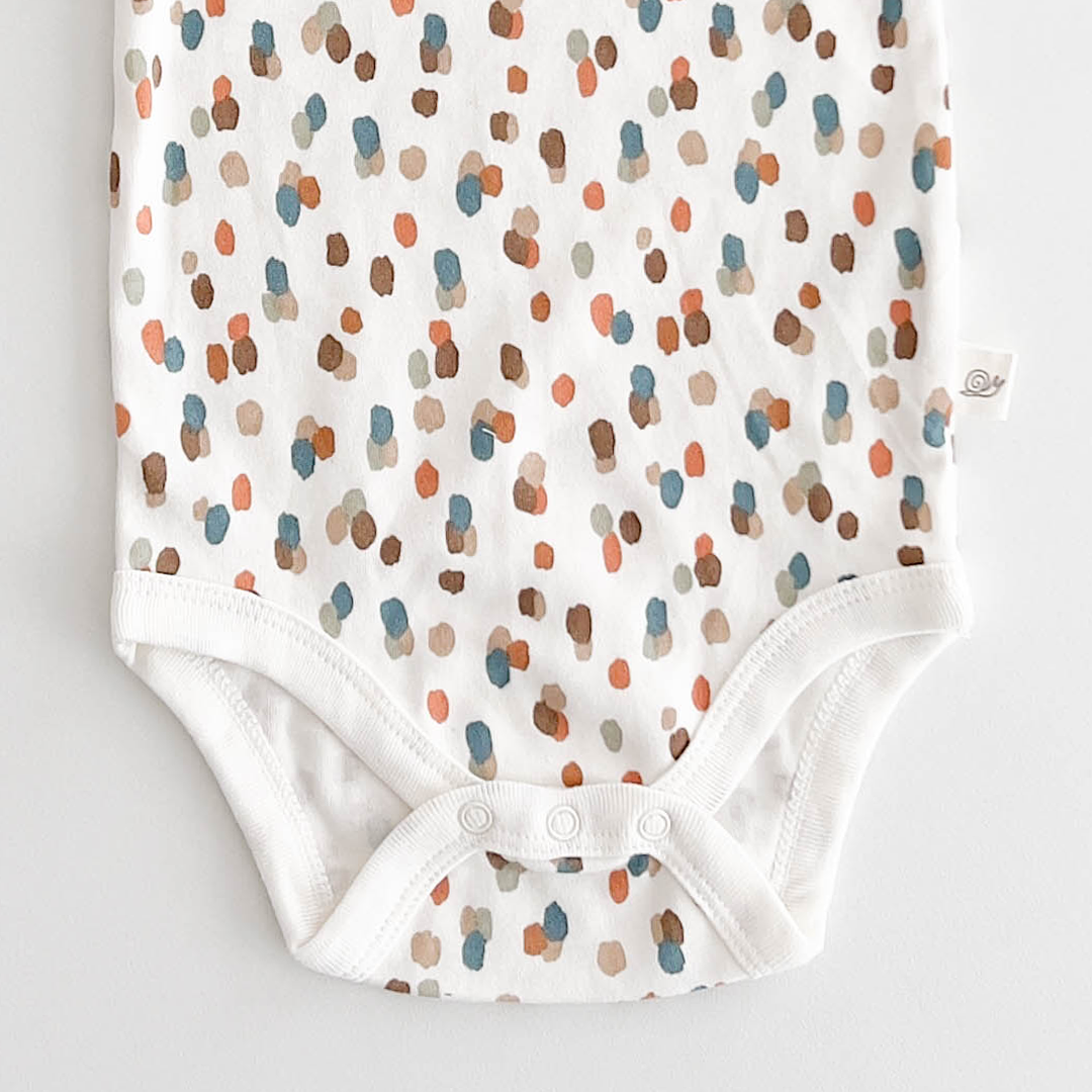 WHITE PATTERNED COTTON ONESIE