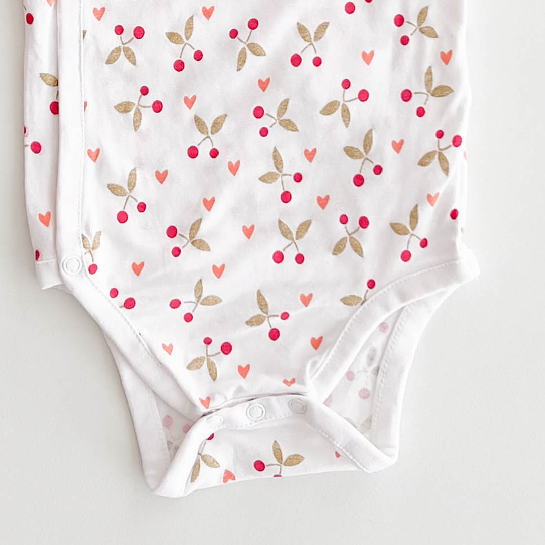 WHITE PRINTED WRAP SLEEPSUIT