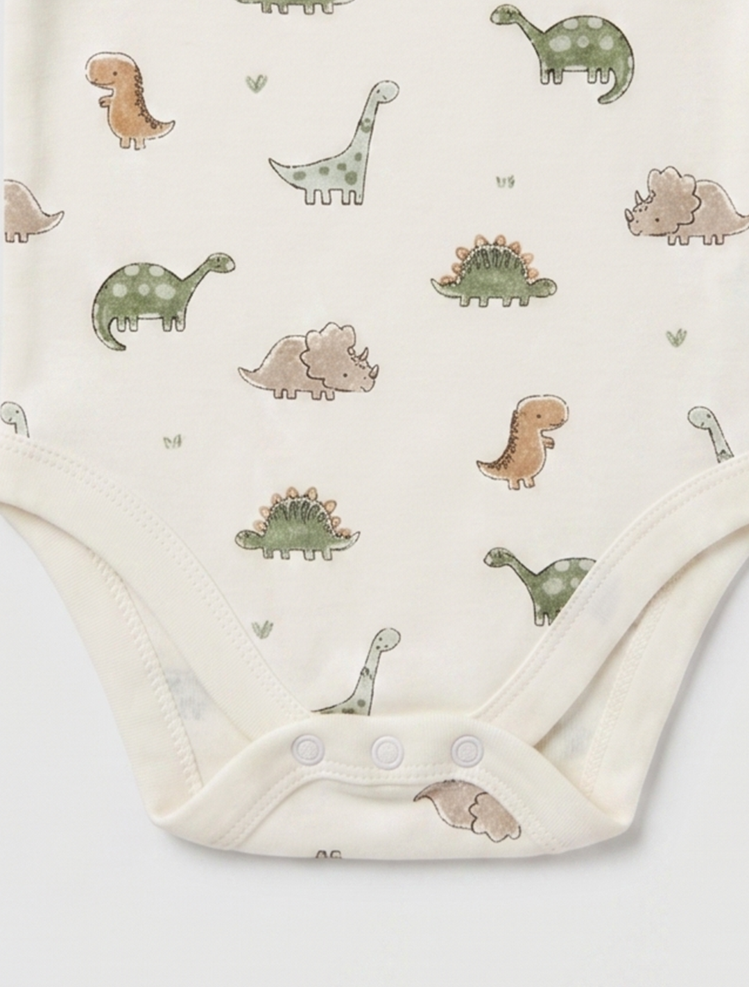 DINO PRINTED ONESIE