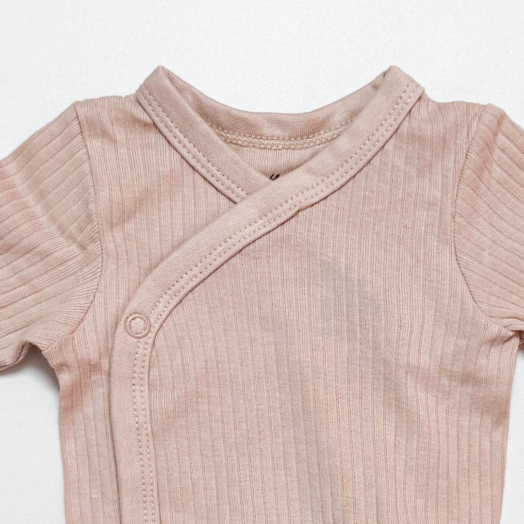 CREAM WRAPOVER RIBBED ONESIE