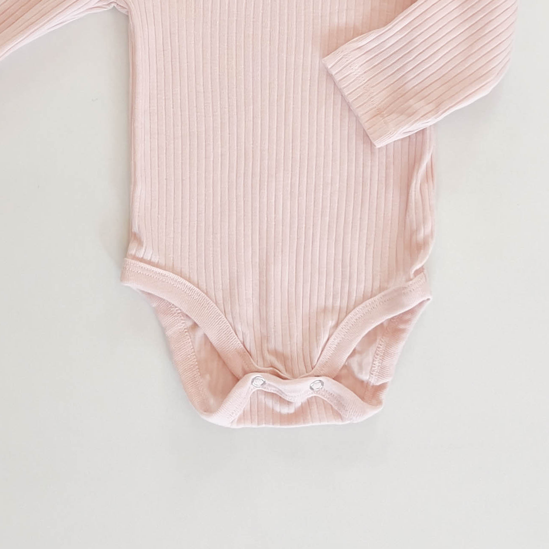 CREAMY PEACH RIBBED ONESIE