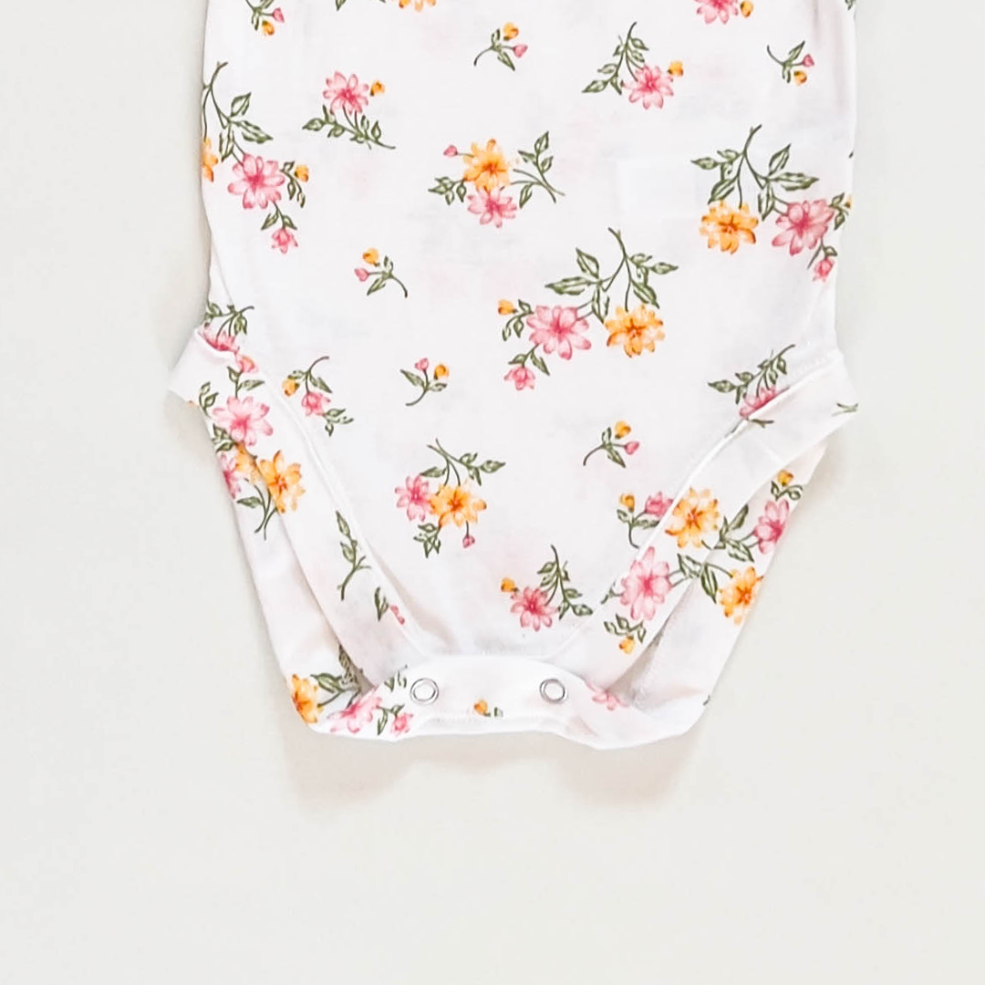 WHITE FLORAL GIRLS ONESIE