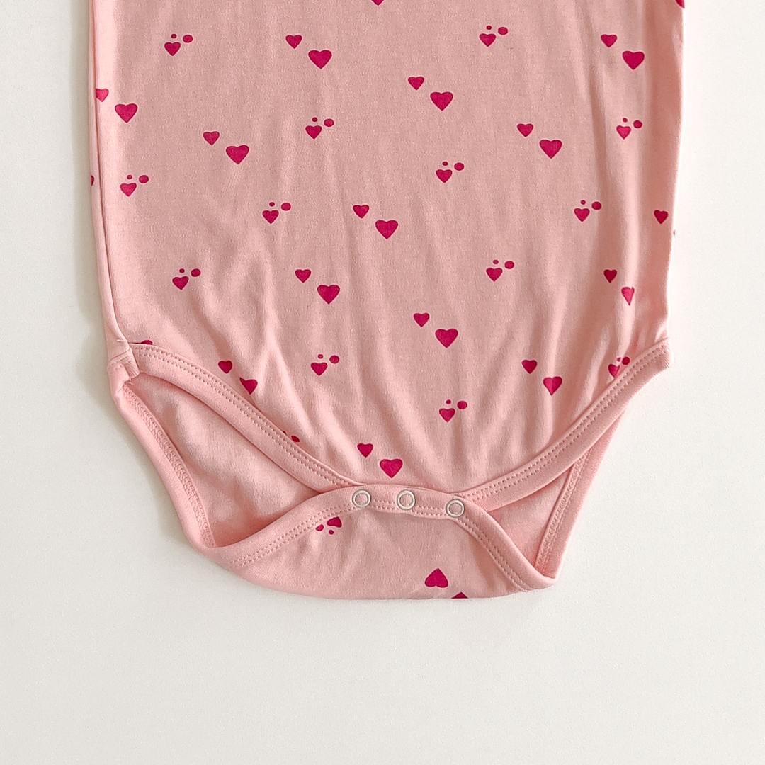 PINK LOVE PATTERNED ONESIE