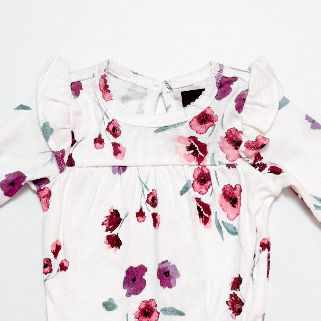 WHITE FLORAL RUFFLED ONESIE