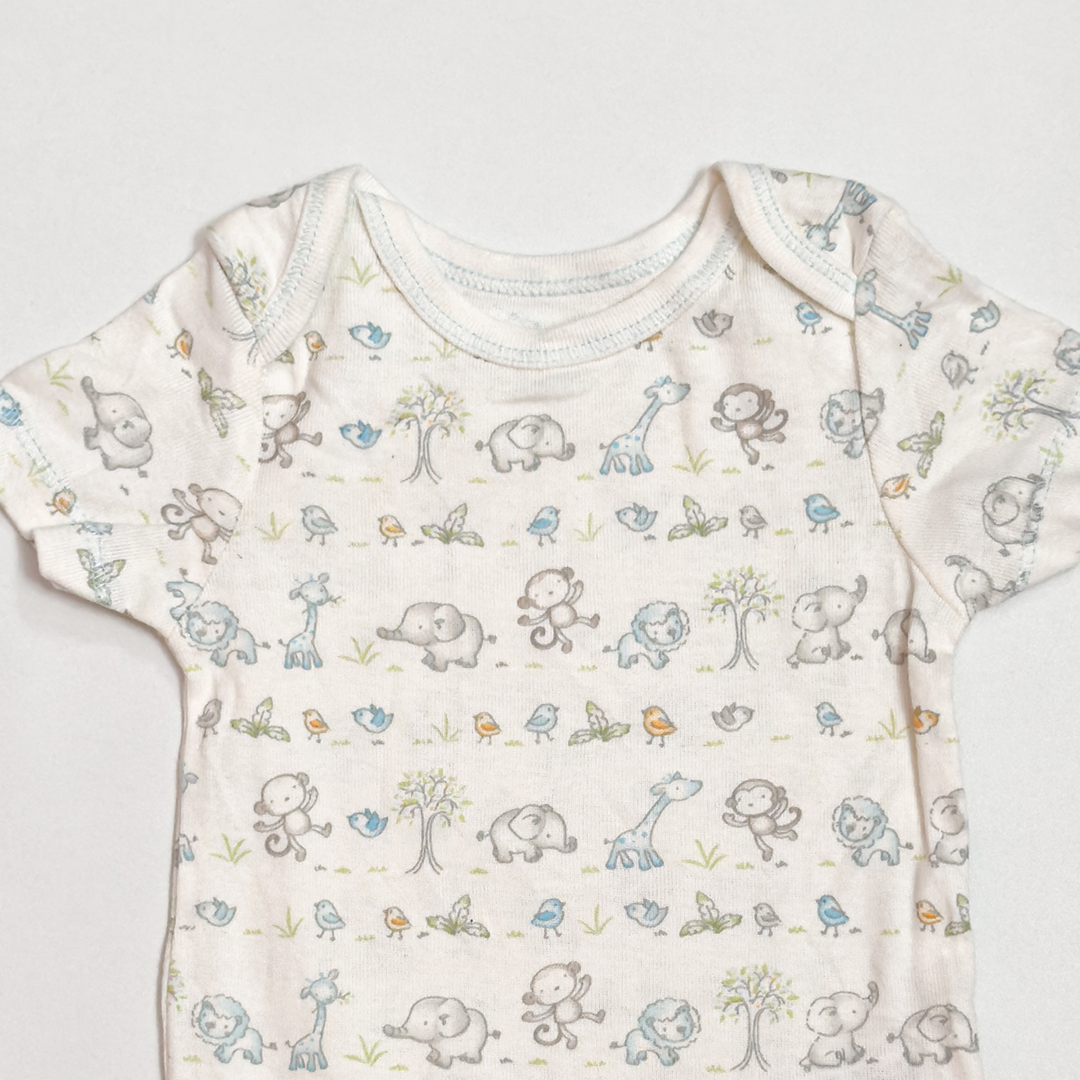 WHITE ANIMAL PRINTED ONESIE