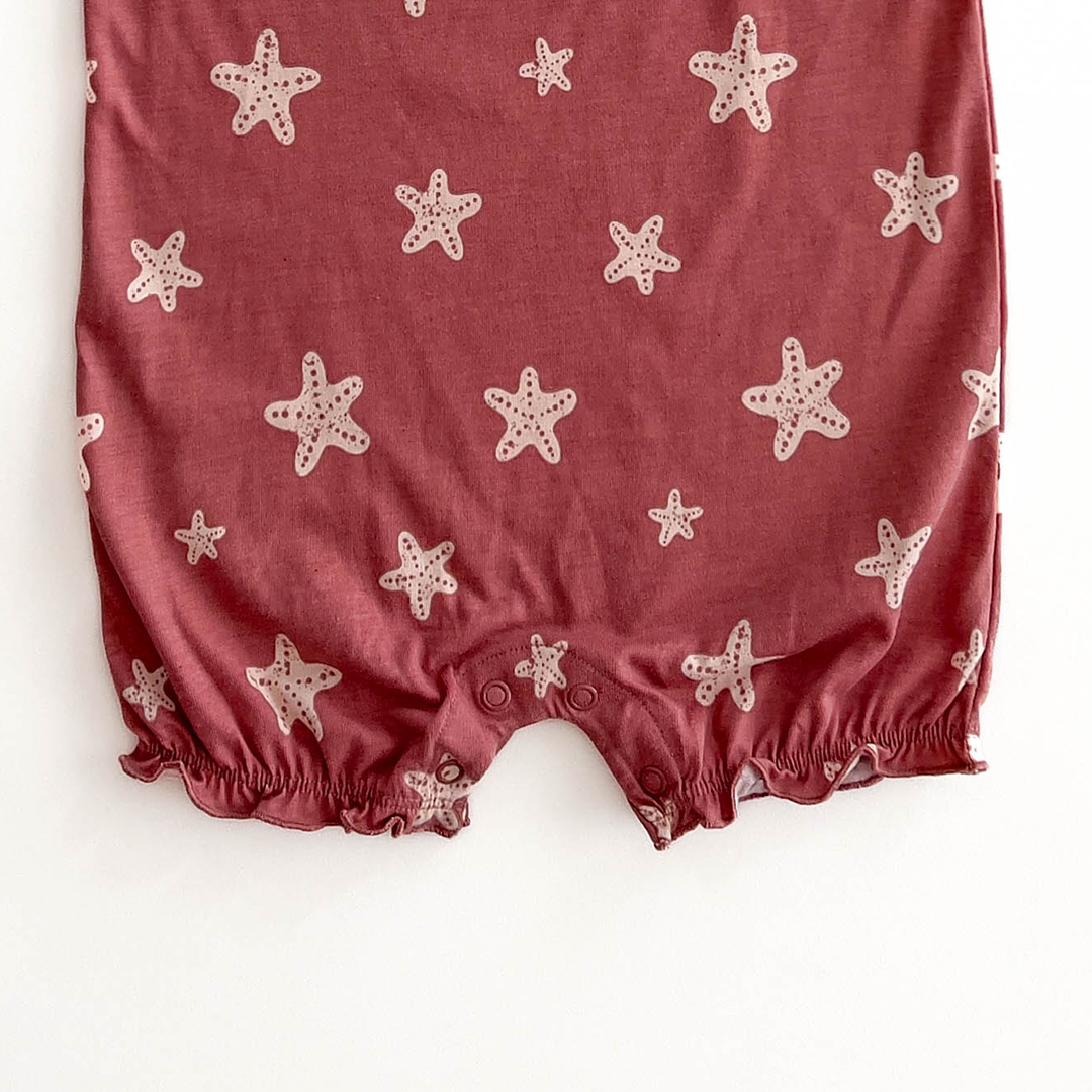 FLUTTER-SLEEVED PATTERNED JUMPSUIT